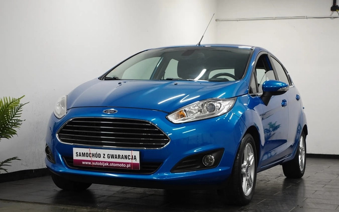 Ford Fiesta cena 26900 przebieg: 166556, rok produkcji 2013 z Wołów małe 781